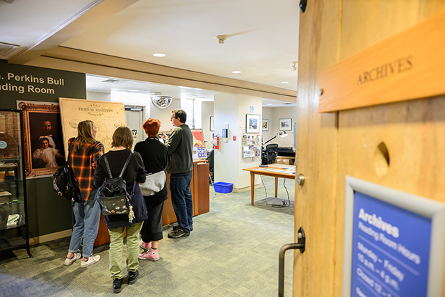 People looking at an exhibit