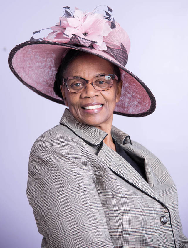 Sonia Nunes modelling a stylish Church Hat.