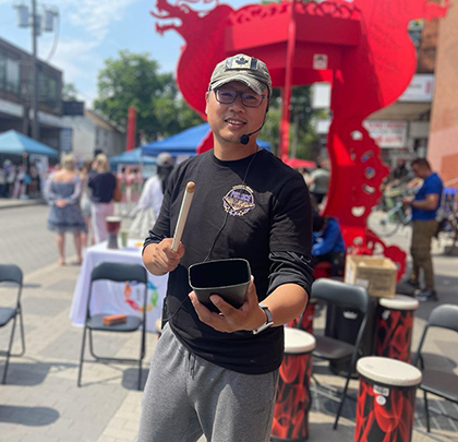 A man holding a drum