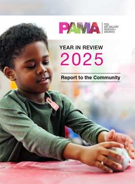 child doing art on a table