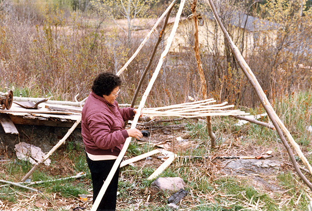 Lady holding wood